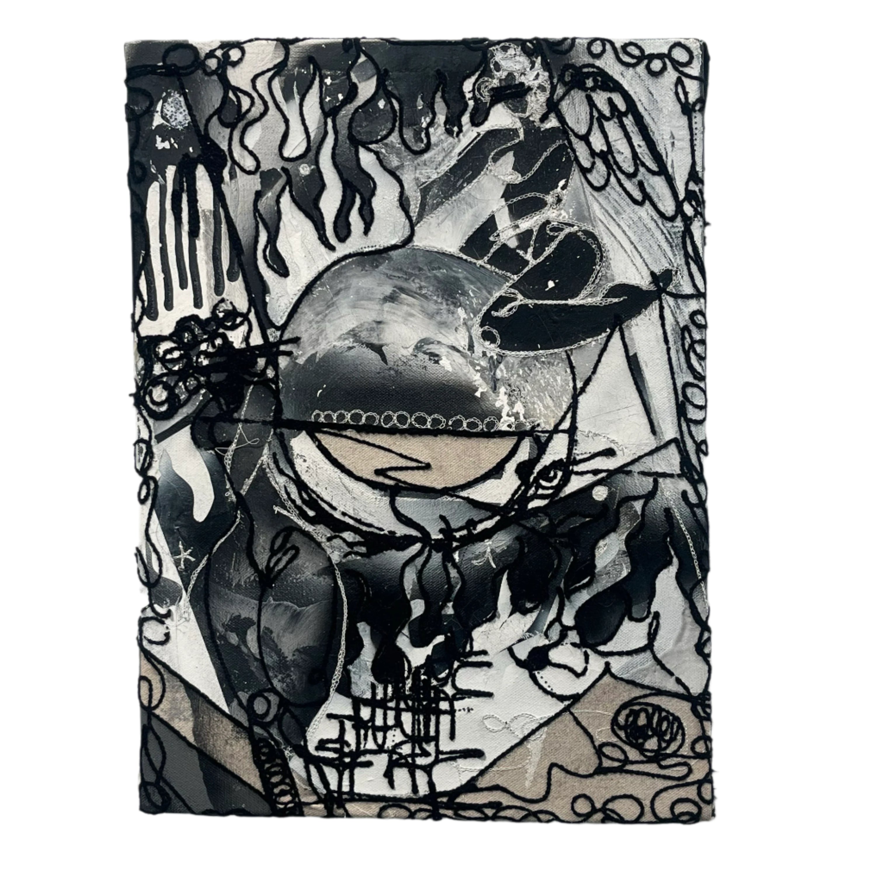 Abstract black and white artwork on a textured surface